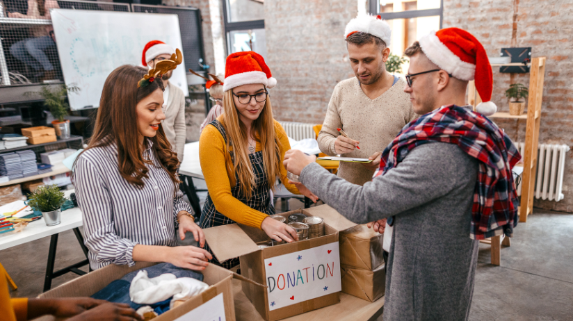 Group of young adults organizing a Christmas donation