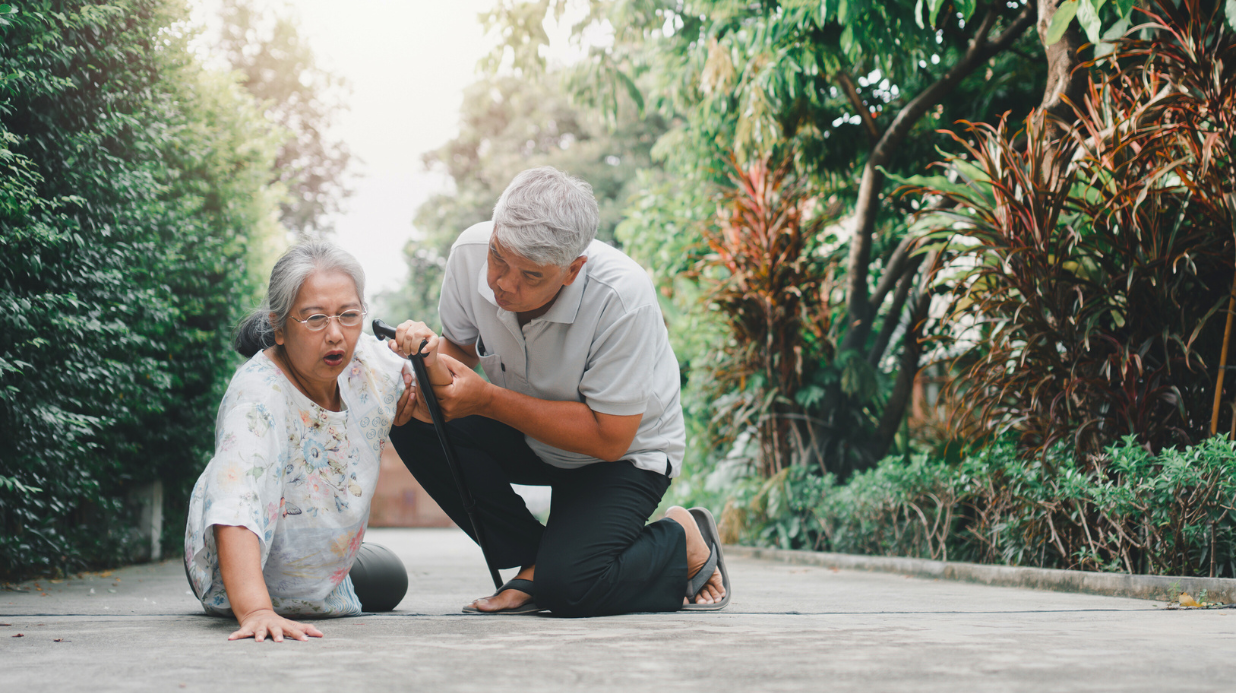 Blog Covers – 2025-09-10T123356.584 Senior woman being helped up after a fall by her husband