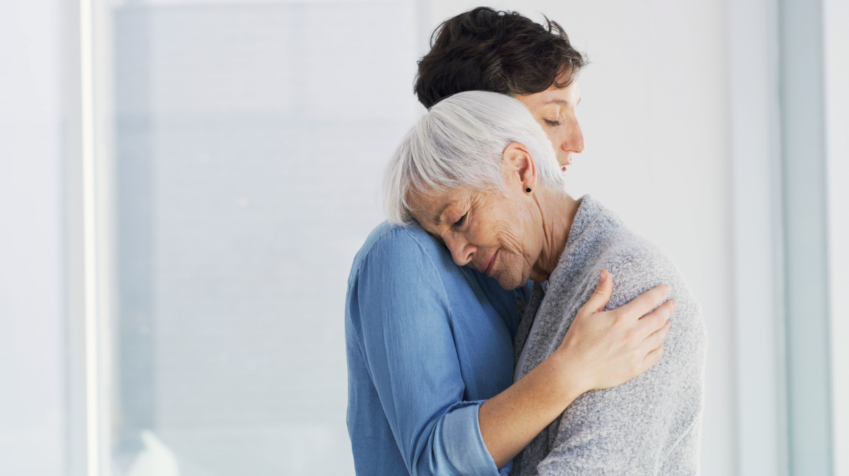 Blog Covers – 2025-10-06T155406.170 Adult woman hugging her senior mom