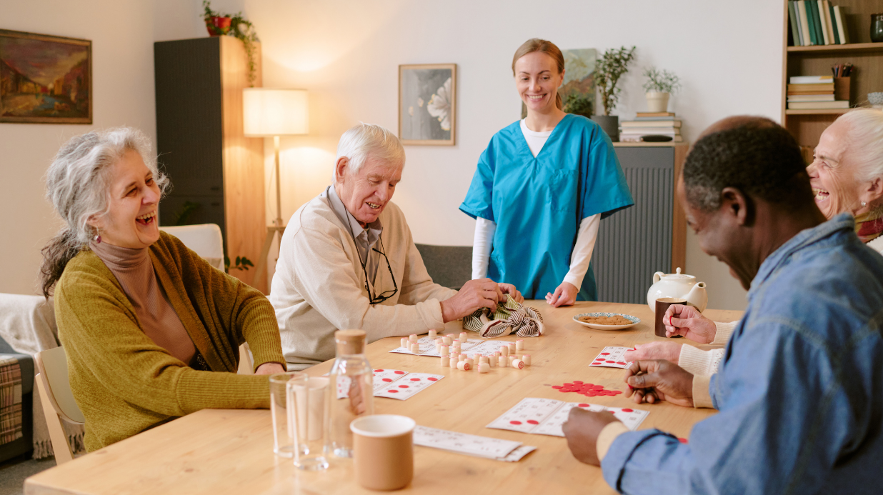 Group of seniors playing bingo and laughing