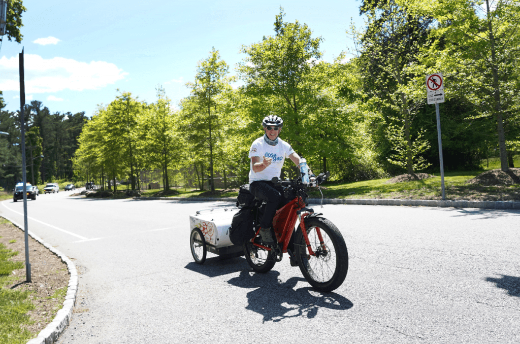 Jeff Salter rides on e-bike for Close the Gap in Senior Care